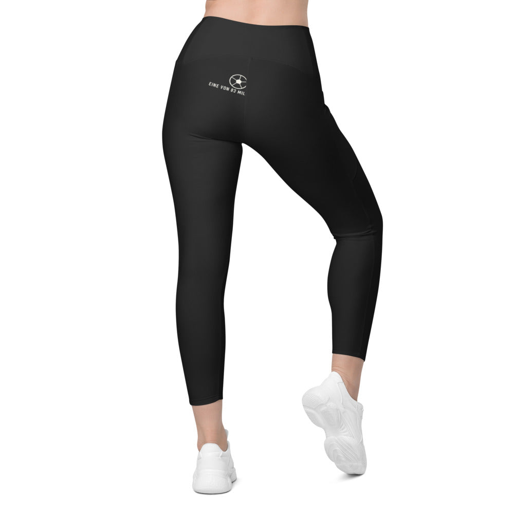 Eine von 83 Millionen Leggings mit Taschen – Schwarz